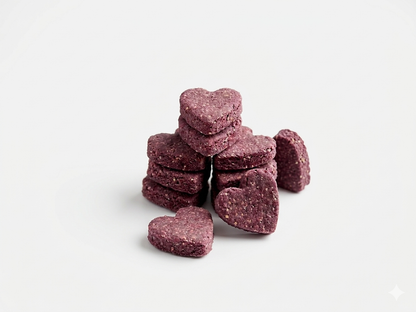 Heart-shaped crunchy dog treats with a white background