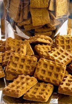 Chicken and Waffles crunchy dog treats from Beyondwhiskers - waffle-shaped treats with grid pattern made with real chicken and maple flavor
