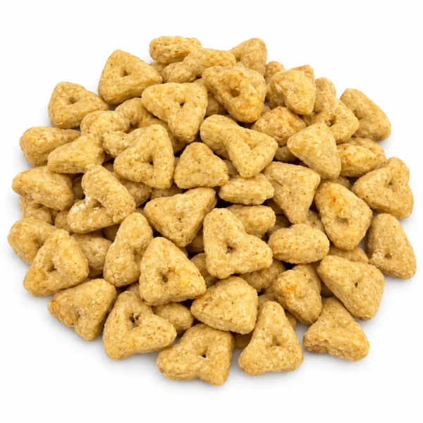 Pale golden triangular Apple Orchard crunchy chicken dog treats on white